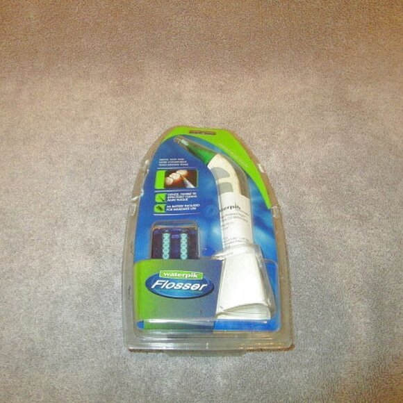 NEW Vtg WATERPIK Cordless WATER Oral FLOSSER Dental TIPS Teeth Cleaner FL-110 - Picture 1 of 9